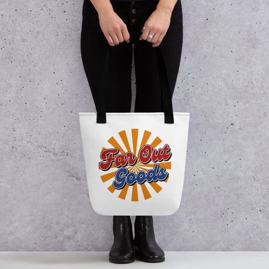 Retro orange sunburst design with Far Out Goods text in red and blue script on a black cotton tote bag.