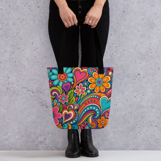 Polyester tote bag featuring a colorful 70s psychedelic doodle pattern of groovy flowers, retro swirls, and hearts.