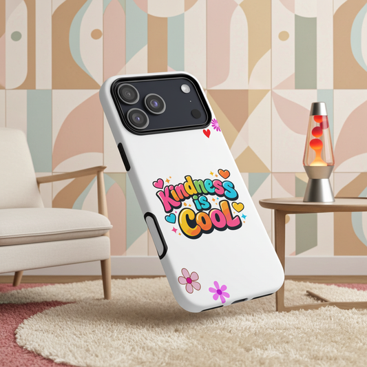 Colorful "Kindness is Cool" bubble text with bright hearts and stars on a black protective iPhone phone case.
