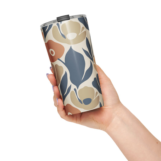 Stainless steel travel tumbler featuring a seamless retro floral print in terracotta, ochre, and deep navy blue.