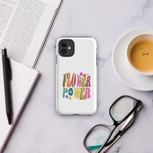 iPhone tough case featuring a 1970s-style flower power design with vibrant orange, pink, and yellow floral patterns.