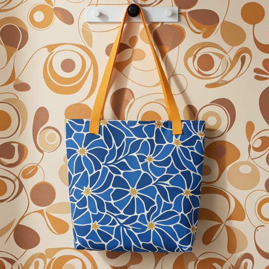 Mosaic pattern tote bag with vibrant blue flowers and gold star centers in a modern boho style by Far Out Goods