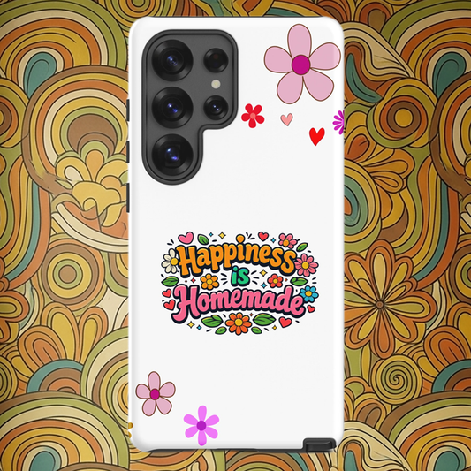 Groovy Samsung Galaxy case with 'Happiness is Homemade' text, surrounded by 70s flowers and hearts on a black background.