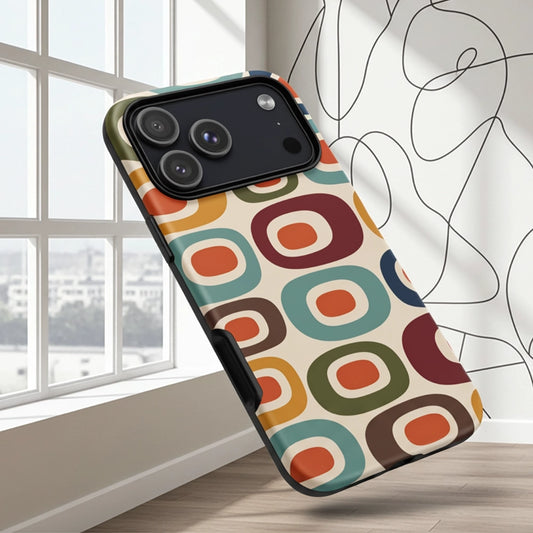 Retro 1970s mid-century modern geometric oval pattern TPU iPhone case featuring colorful mustard, orange, teal, and navy shapes