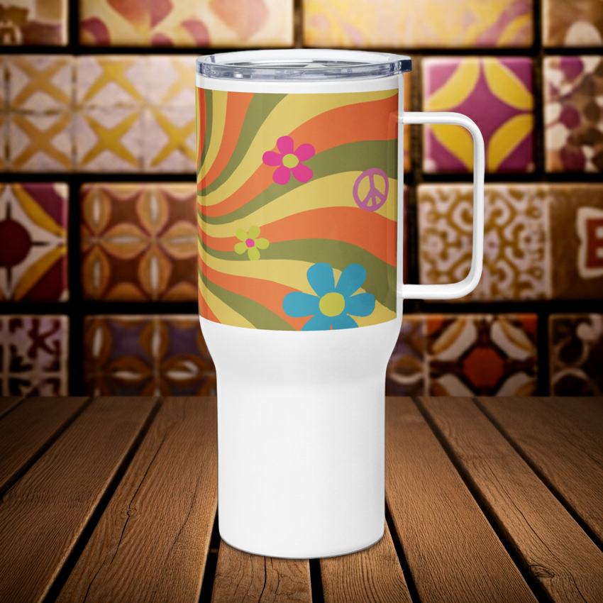 Stainless steel travel mug with handle featuring a large psychedelic peace sign filled with vibrant 70s floral patterns in orange, pink, and yellow.
