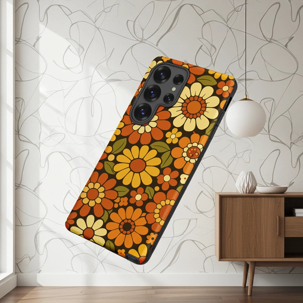 Retro 70s floral pattern with orange, yellow, and white daisies printed on a flexible clear TPU Samsung Galaxy case.
