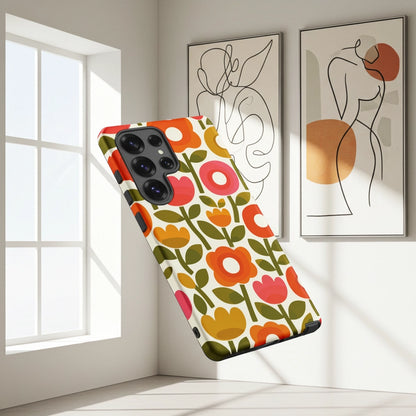 Retro 1970s flower power pattern TPU Samsung case featuring geometric orange, pink, and yellow flowers with green leaves