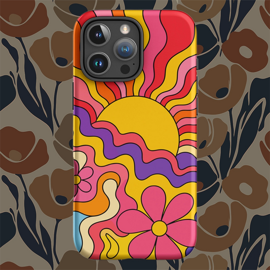 Vibrant 1970s psychedelic iPhone case featuring a wavy retro sunburst sunset surrounded by colorful groovy flowers.