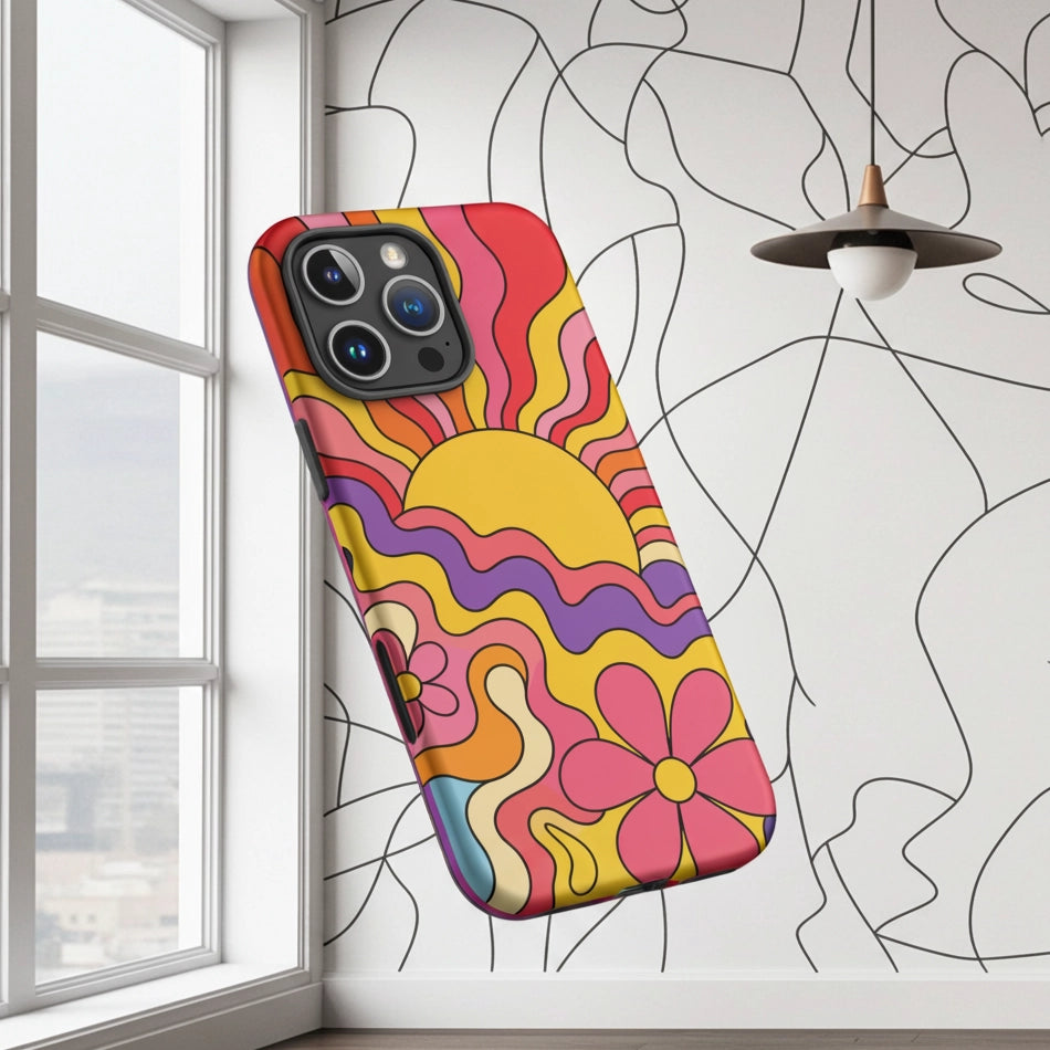 Vibrant 1970s psychedelic iPhone case featuring a wavy retro sunburst sunset surrounded by colorful groovy flowers.
