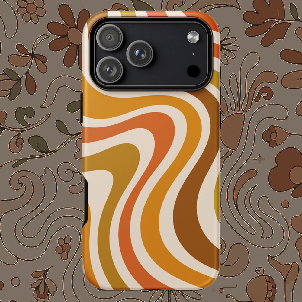 Retro 70s groovy wavy pattern in orange, mustard, brown, and cream printed on a flexible TPU iPhone protective case.