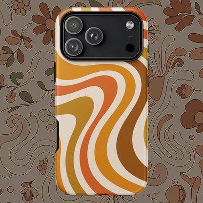 Retro 70s groovy wavy pattern in orange, mustard, brown, and cream printed on a flexible TPU iPhone protective case.