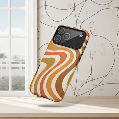 Retro 70s groovy wavy pattern in orange, mustard, brown, and cream printed on a flexible TPU iPhone protective case.