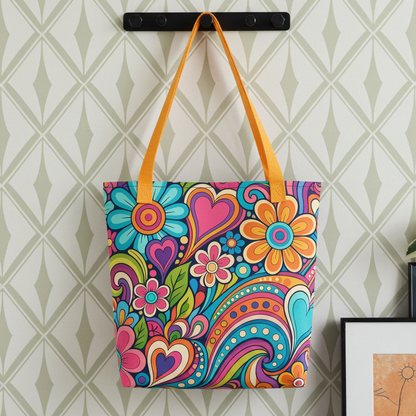 Polyester tote bag featuring a colorful 70s psychedelic doodle pattern of groovy flowers, retro swirls, and hearts.