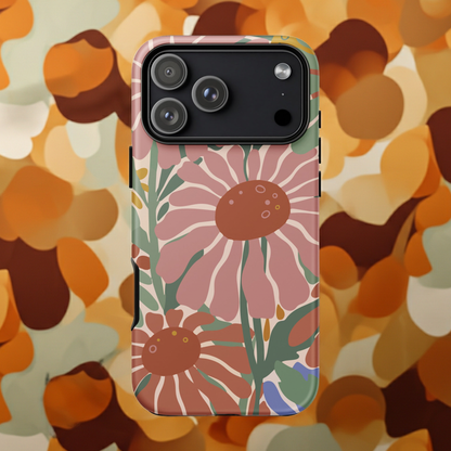 70s style flower power pattern with pink, green, and orange daisies on a bohemian iPhone phone case.