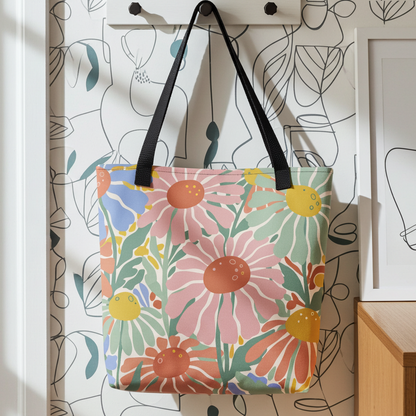 tote bag featuring a retro 70s floral pattern in pink, green, and blue by Far Out Goods