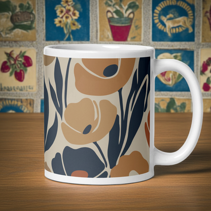 Ceramic coffee mug printed with a seamless retro floral pattern in earthy terracotta, ochre, and deep navy blue.