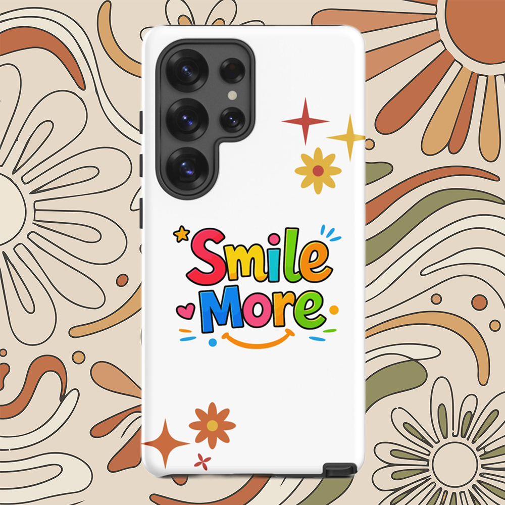 Smile More, bubbly lettering with a yellow sun-smile and pink heart on a black Samsung Galaxy phone case.