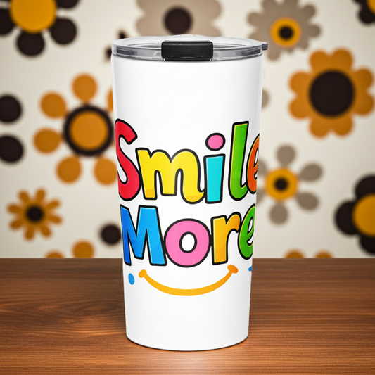 Smile More" bubbly lettering with a yellow sun-smile and pink heart on a black travel tumbler