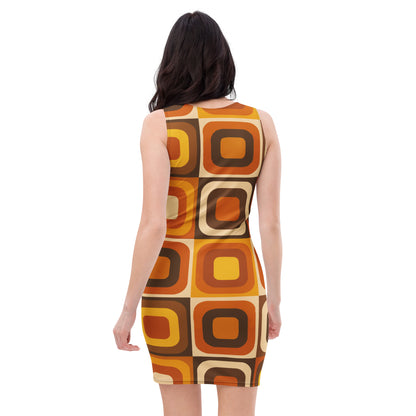 Woman wearing a 70s retro dress with a groovy geometric pattern of orange, mustard, and brown rounded mod squares.