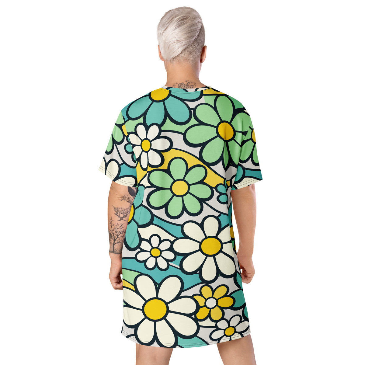 Retro 70s style t-shirt dress featuring a vibrant pattern of blue, yellow, and green flowers with wavy lines