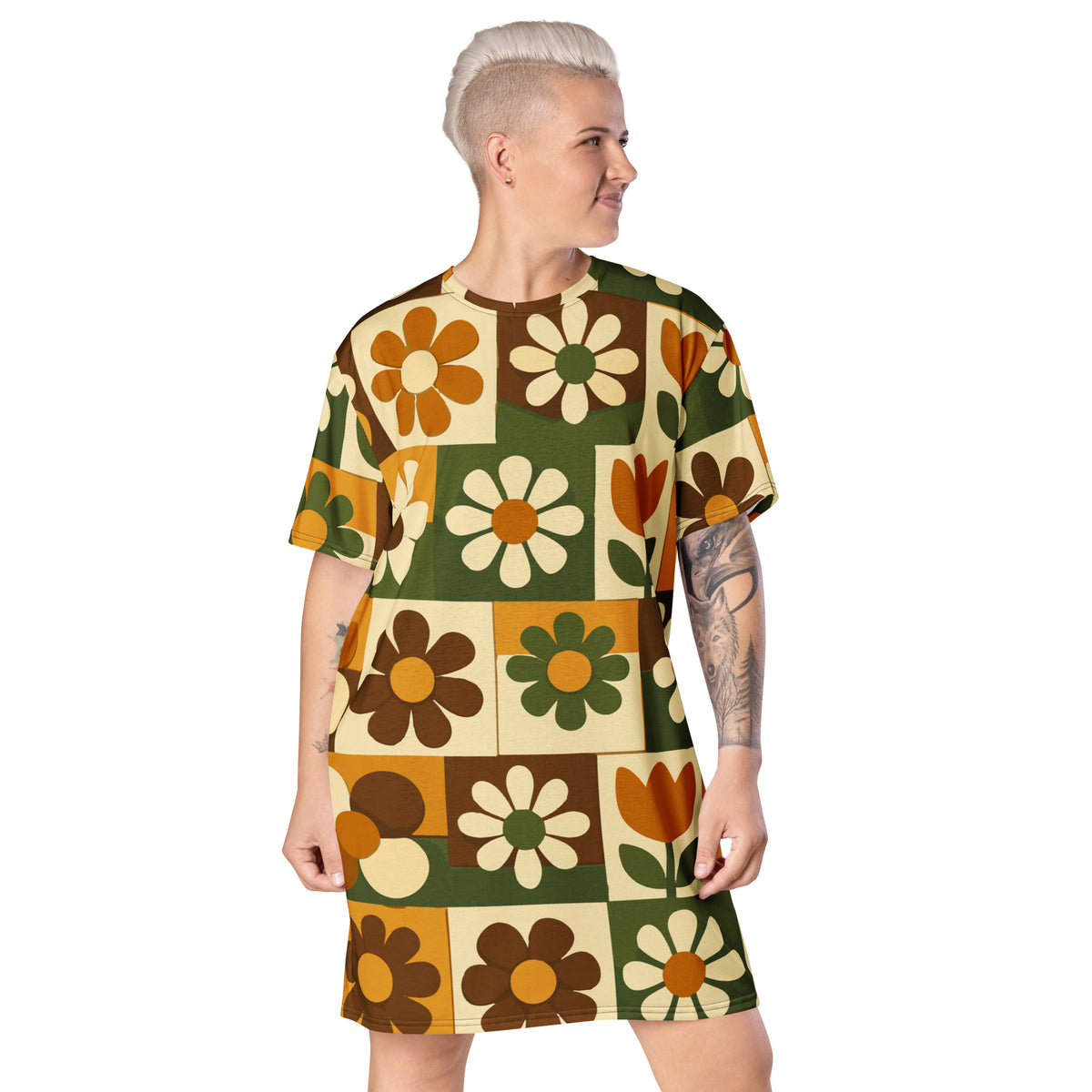 Retro 1970s mod floral tile pattern in orange, green, and brown on a casual t-shirt dress.