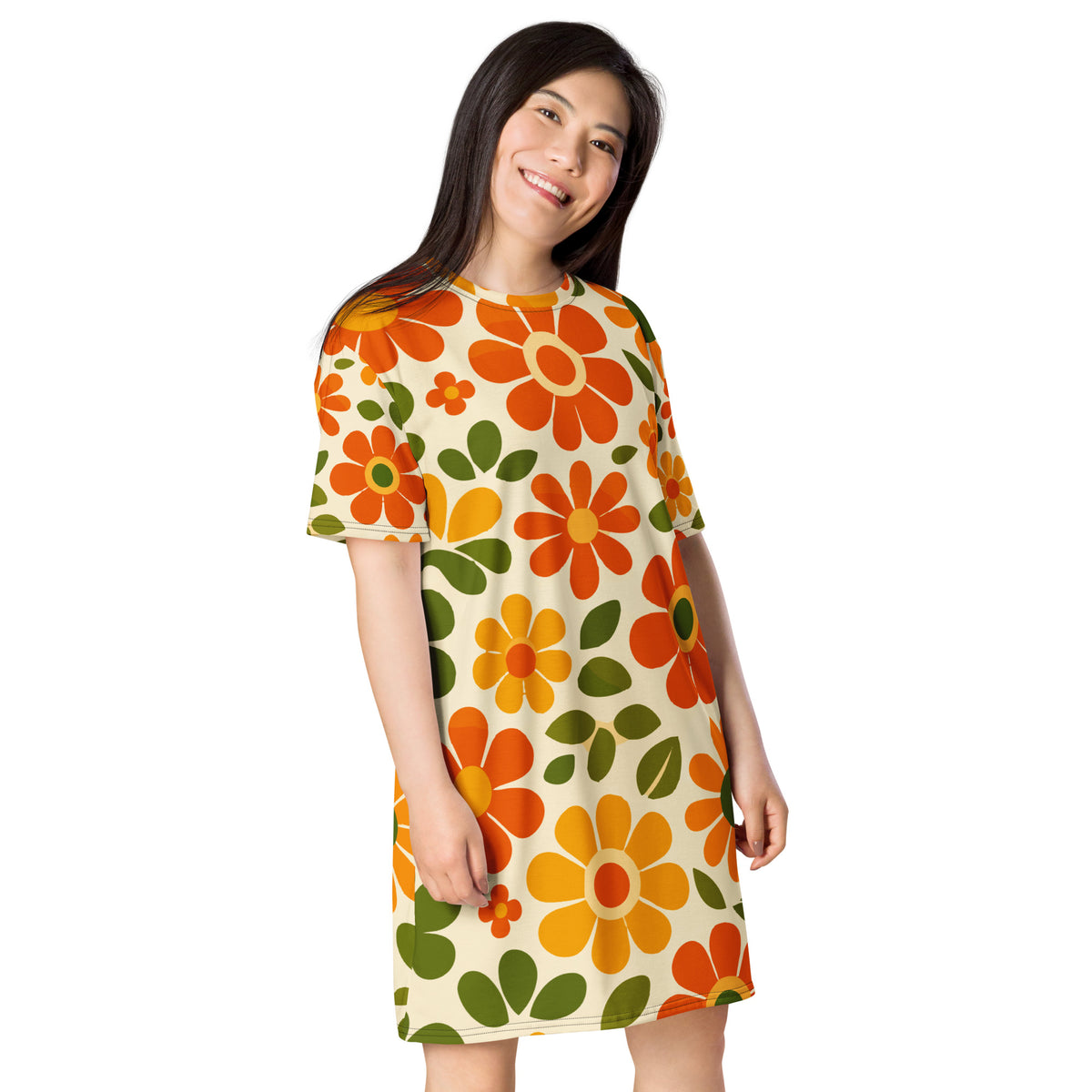 Vintage 70s retro flower power pattern with orange, yellow, and green daisy motifs printed on a comfy T-shirt dress.