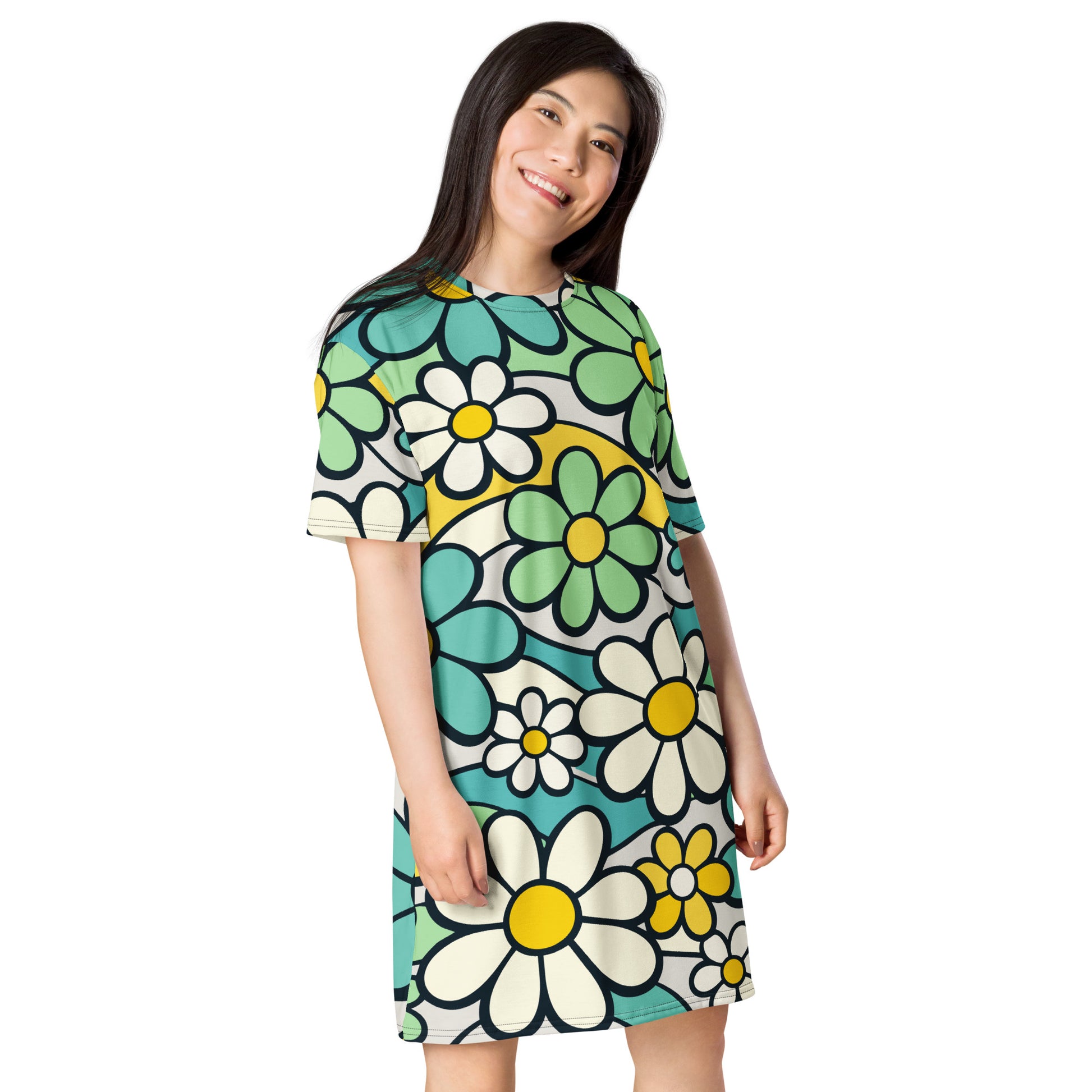 Retro 70s style t-shirt dress featuring a vibrant pattern of blue, yellow, and green flowers with wavy lines