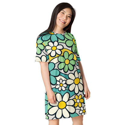 Retro 70s style t-shirt dress featuring a vibrant pattern of blue, yellow, and green flowers with wavy lines