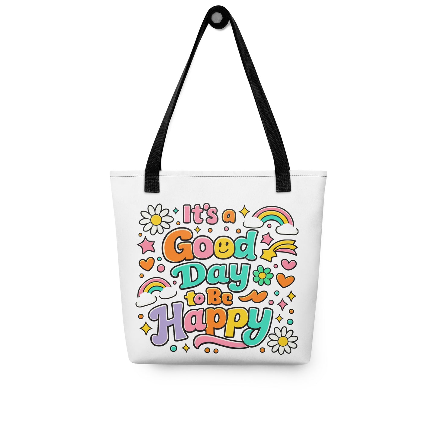 Retro 70s tote bag design with "It's a Good Day to Be Happy" text, rainbows, and daisies on a black background.