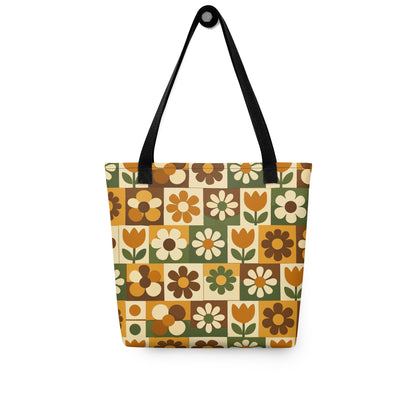 Polyester tote bag featuring a 70s retro floral tile pattern in orange, brown, and green from Far Out Goods.