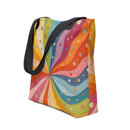 Polyester tote bag featuring a 70s retro rainbow quilt sunburst design with colorful swirling wavy stripes and tiny flowers.