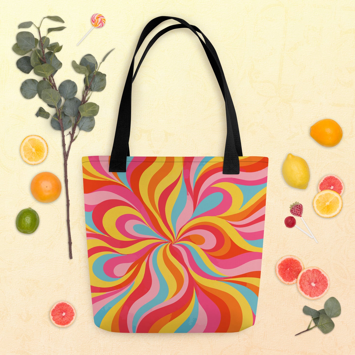 Canvas tote bag with a bold retro 70s abstract wave pattern in flowing orange, mustard yellow, and cream swirls.