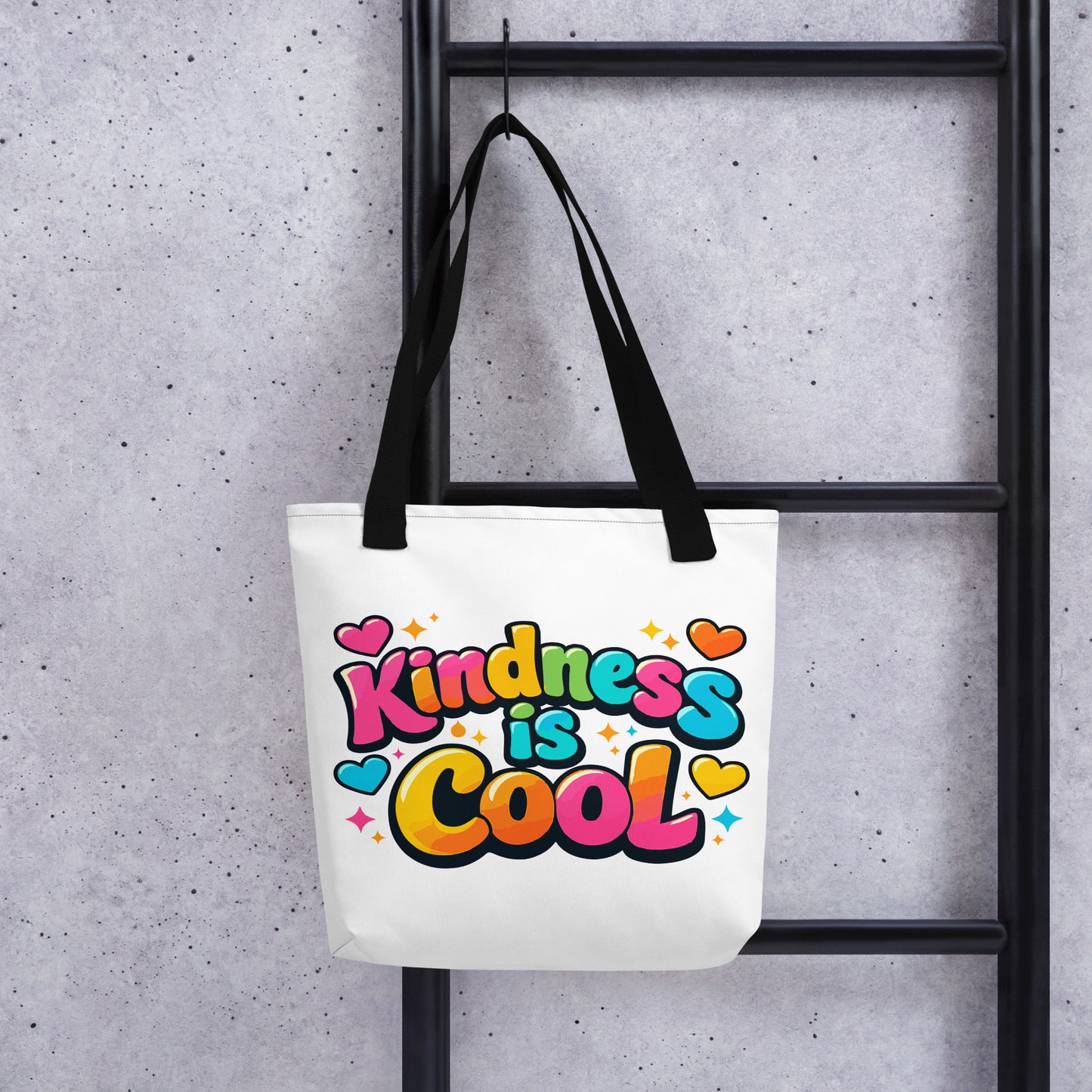 Vibrant 3D bubble lettering saying Kindness is Cool with colorful hearts and stars on a black background for a tote bag.