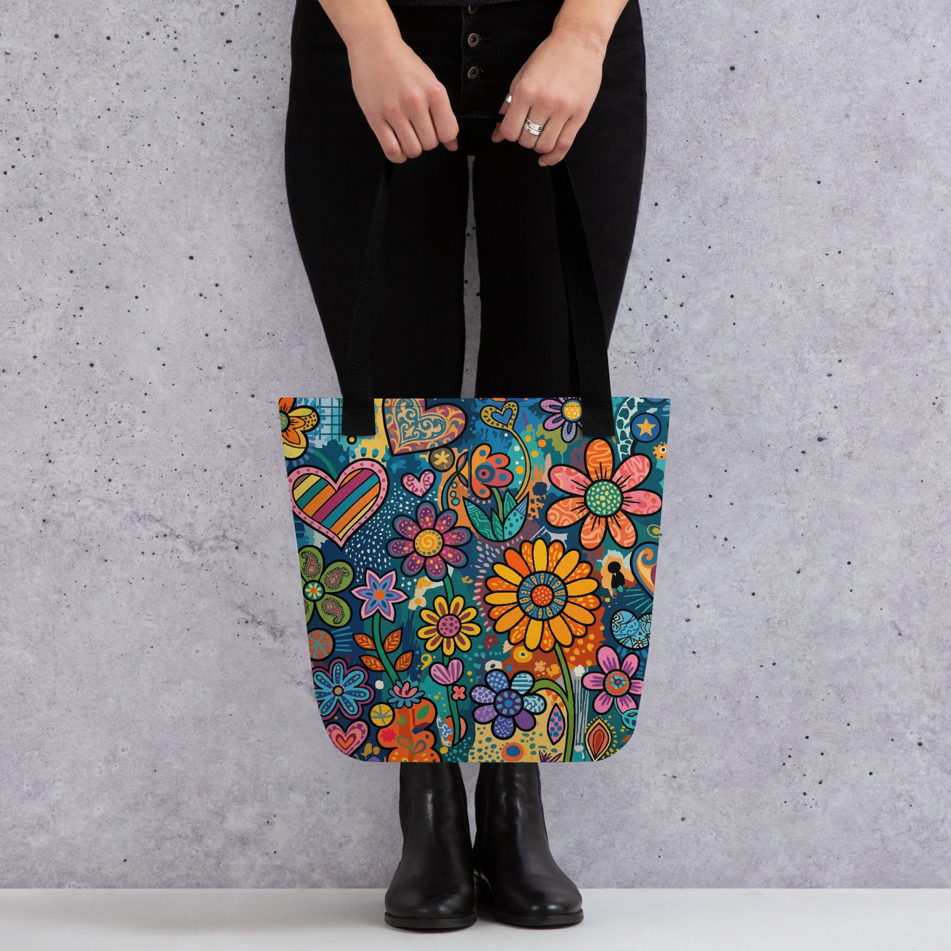 Retro psychedelic polyester tote bag featuring vibrant 60s flower power graphics, colorful hearts, and boho doodle art.