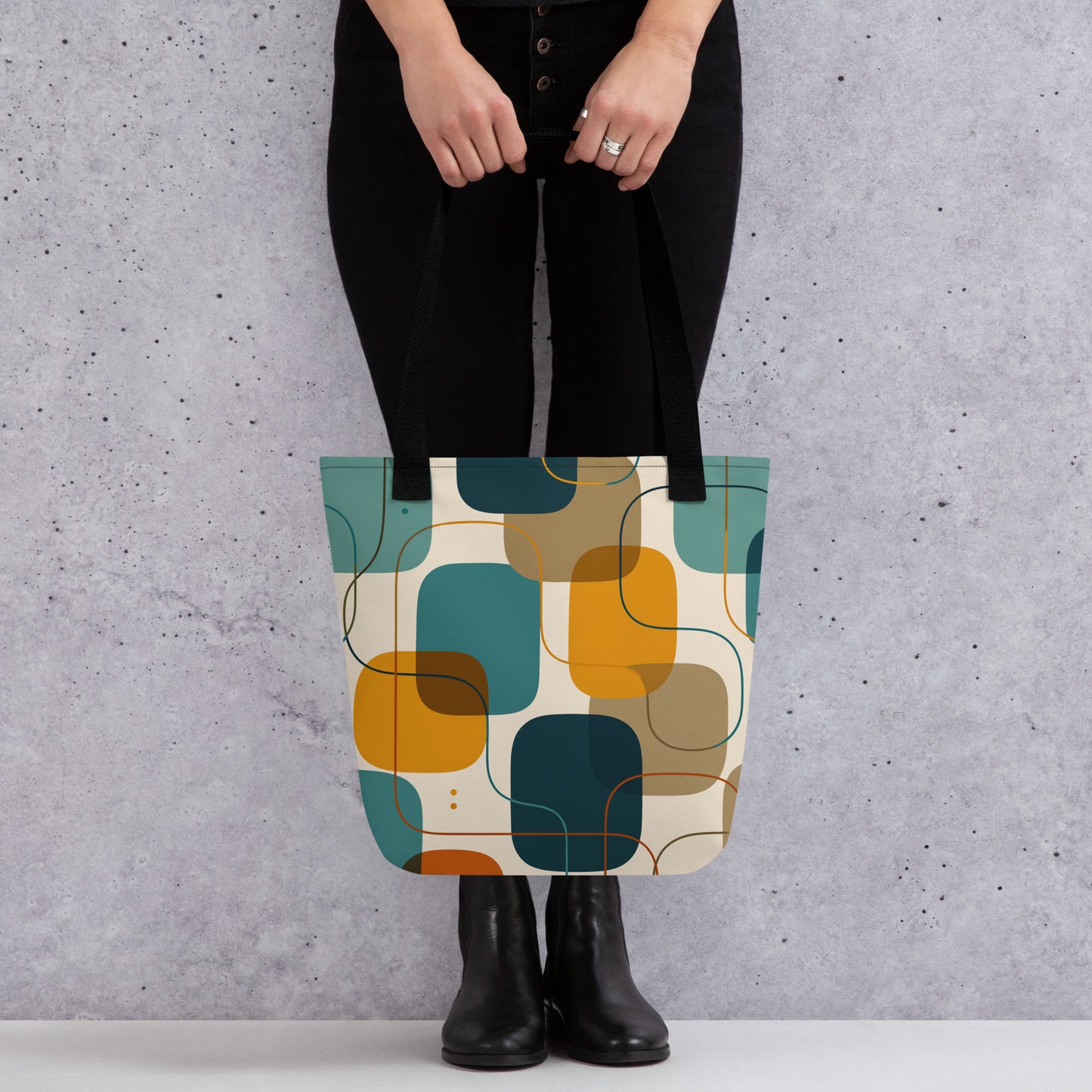 Retro geometric polyester tote bag featuring mid-century rounded squares and lines in teal, mustard yellow, and orange.