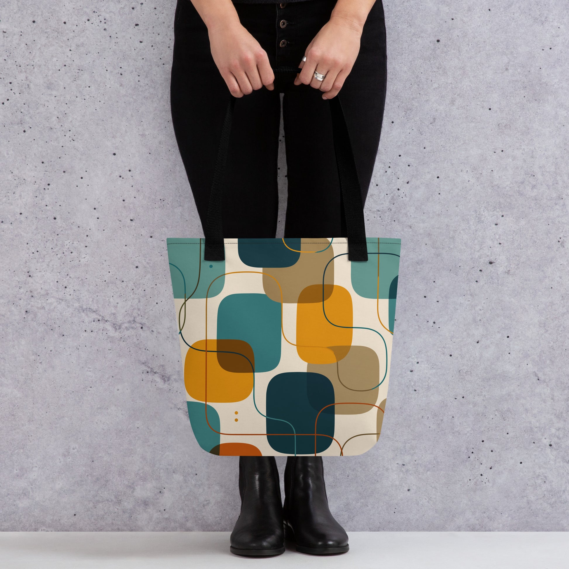 Retro geometric polyester tote bag featuring mid-century rounded squares and lines in teal, mustard yellow, and orange.