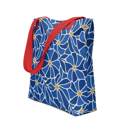 Mosaic pattern tote bag with vibrant blue flowers and gold star centers in a modern boho style by Far Out Goods