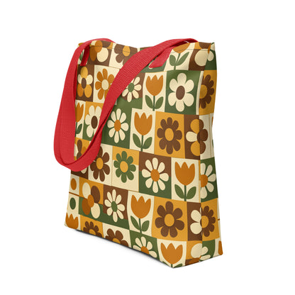 Polyester tote bag featuring a 70s retro floral tile pattern in orange, brown, and green from Far Out Goods.