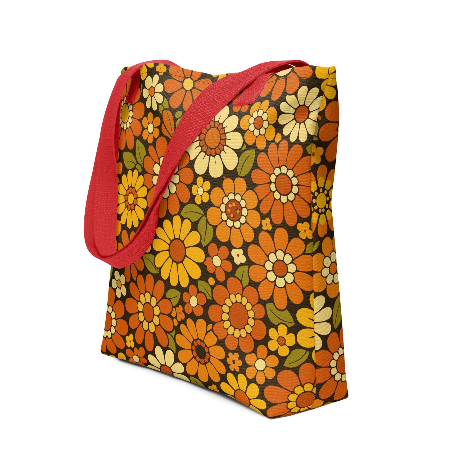 Retro 70s floral pattern polyester tote bag with orange, yellow, and cream daisies on a dark brown background.