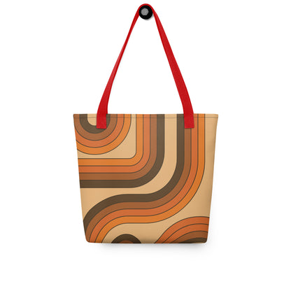 Retro 70s curved stripe pattern in earth tones, brown, and orange printed on a durable polyester everyday tote bag.