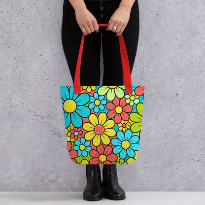 Vibrant 1960s style flower power pattern on a tote bag with blue, yellow, and green retro floral illustrations.