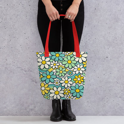 Reusable tote bag featuring a seamless 70s retro floral pattern with teal and yellow daisies and wavy lines.