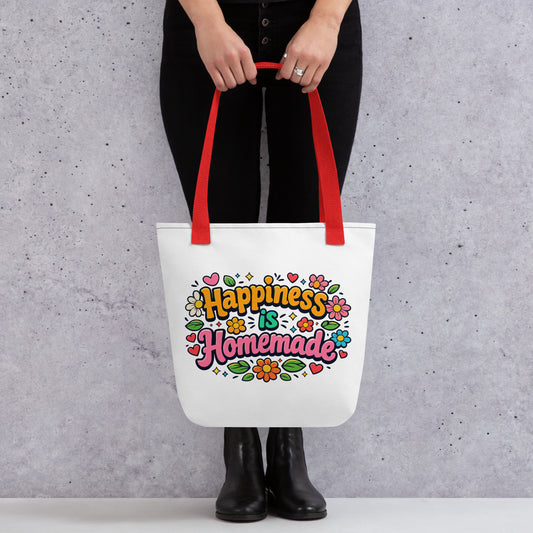 Retro tote bag featuring 'Happiness is Homemade' text with 1970s style flowers and hearts on a black background.