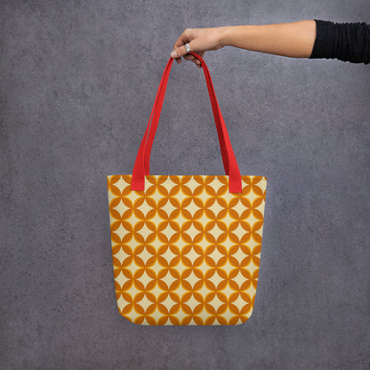 Repeating geometric pattern of interlocking orange and cream circles and stars in a 1970s retro vintage style.