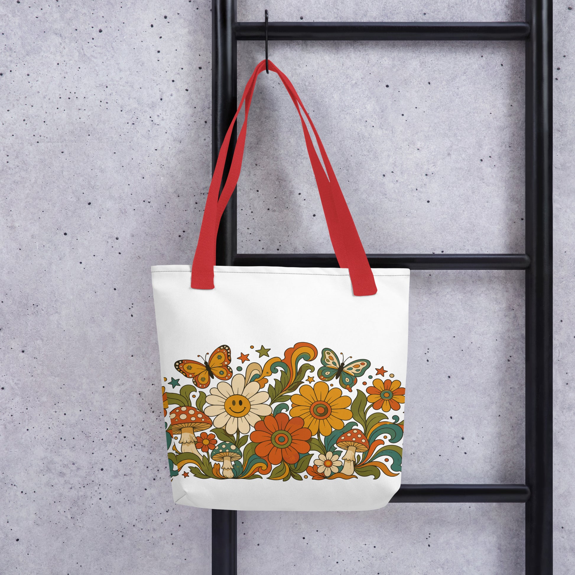 Retro 70s psychedelic tote bag featuring smiley daisies, red spotted mushrooms, and colorful butterflies on black.