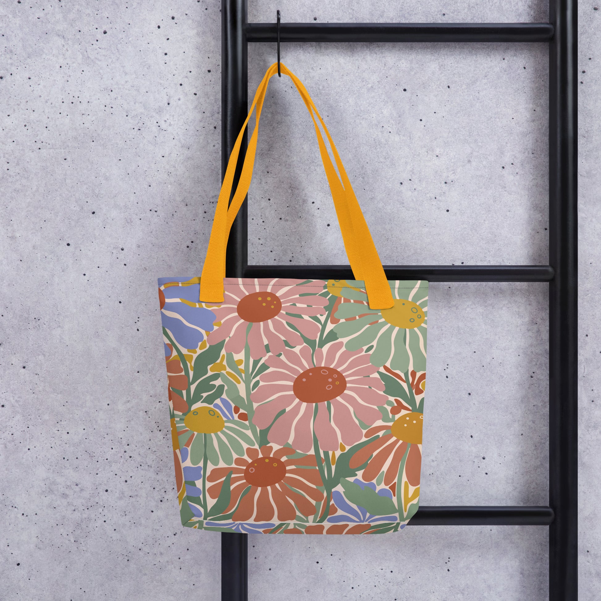 tote bag featuring a retro 70s floral pattern in pink, green, and blue by Far Out Goods