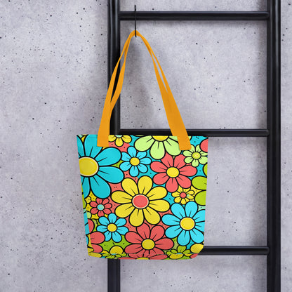 Vibrant 1960s style flower power pattern on a tote bag with blue, yellow, and green retro floral illustrations.