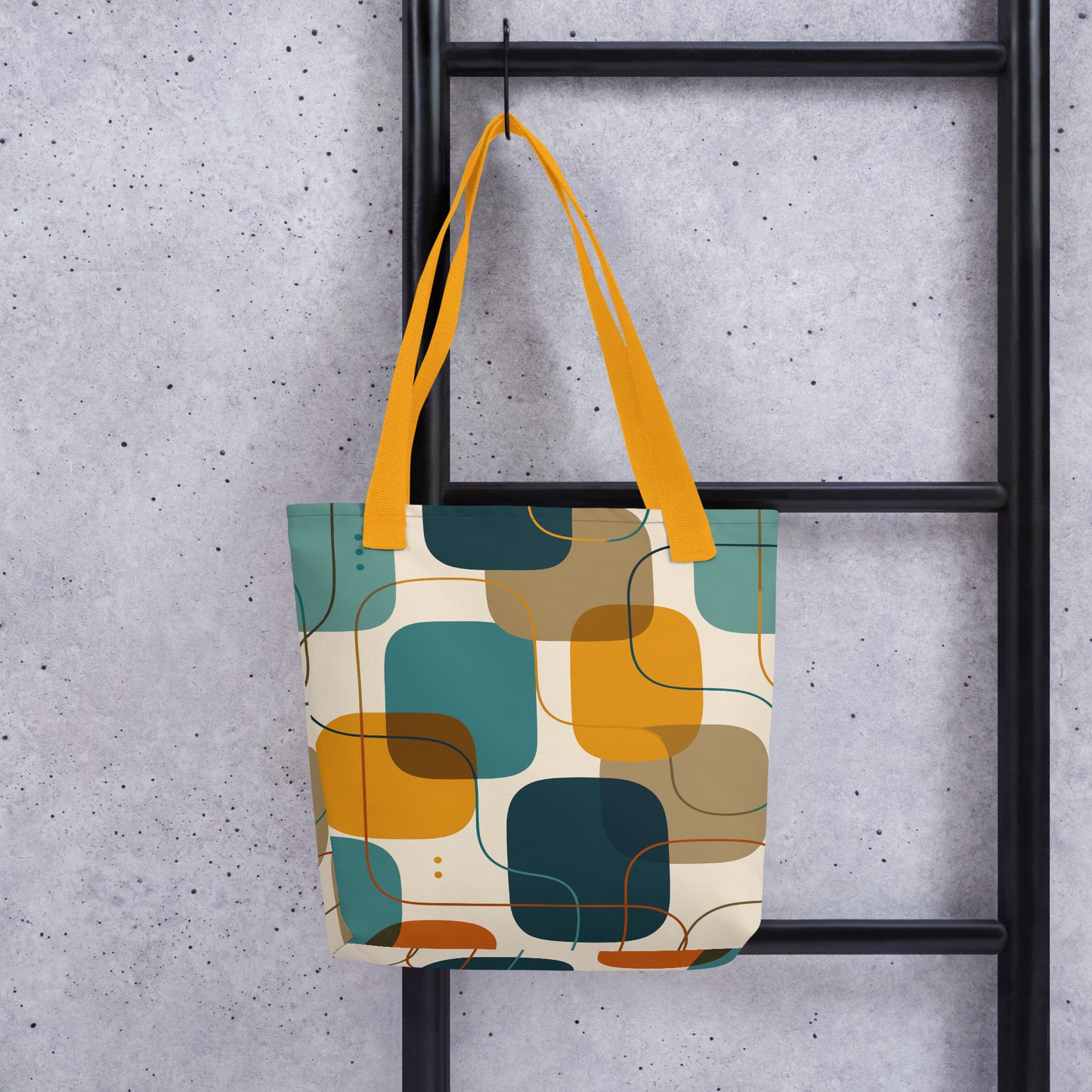 Retro geometric polyester tote bag featuring mid-century rounded squares and lines in teal, mustard yellow, and orange.