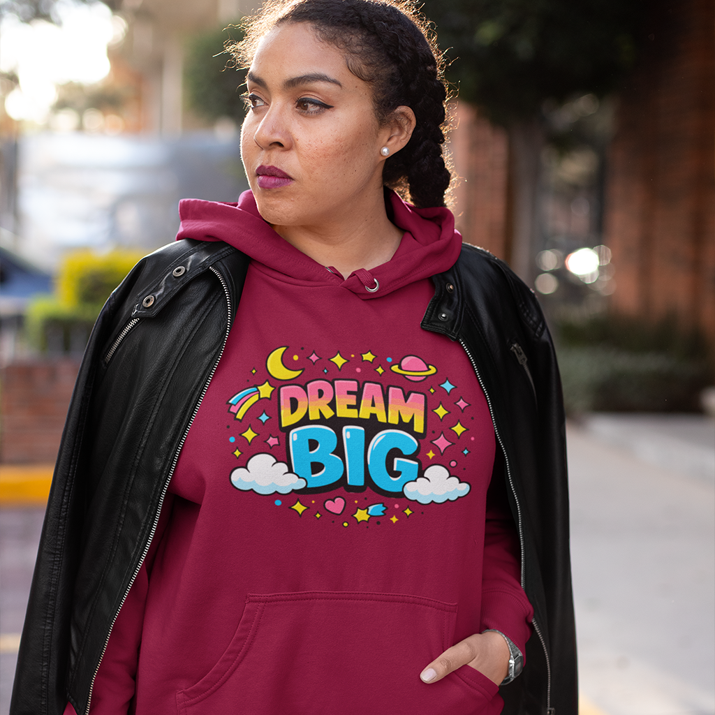 Vibrant Dream Big text in 70s bubble font with pink, yellow, and blue colors, surrounded by stars and a crescent moon.