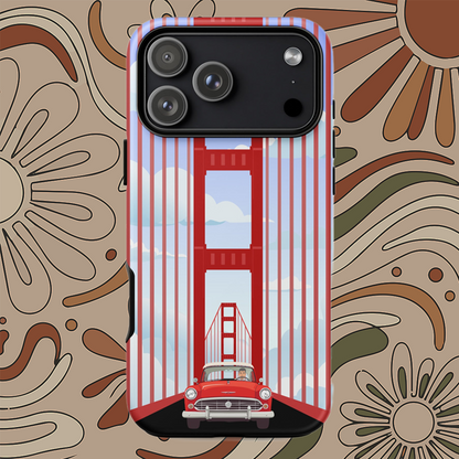 Minimalist illustration of a classic red car driving through the Golden Gate Bridge on an iPhone case